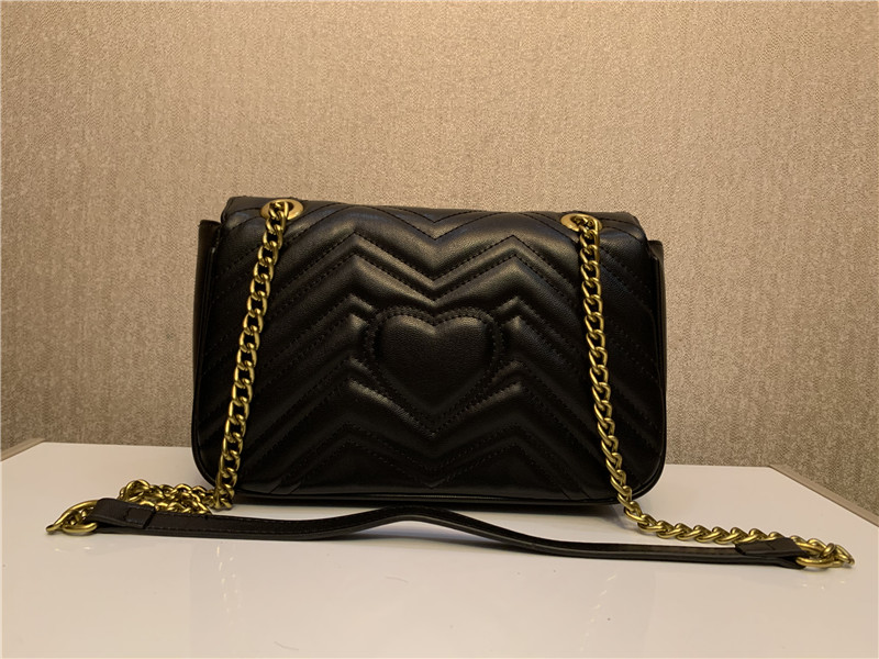 ruched bag with gold chain